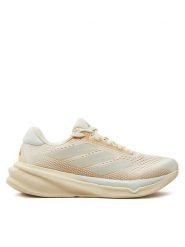 Adidas Buty do biegania Supernova Stride 2 IH8651 Beżowy. Brązowe obuwie sportowe damskie Adidas, z materiału, bez zapięcia, do biegania. Za 379.99 zł.