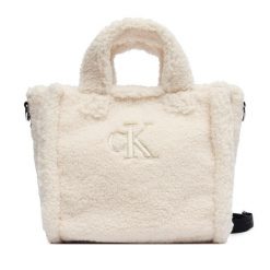 Torebka Calvin Klein Jeans. Brązowe shopper bag Calvin Klein Jeans, bez wzorów, z jeansu, bez dodatków. Za 209.99 zł.