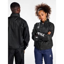 Kurtka ortalionowa piłkarska dla dorosłych Hummel Core XK Spray Jacket. Czarne kurtki damskie Hummel, xl, bez wzorów, bez kaptura. Za 212.50 zł.