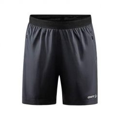 Spodnie treningowe damskie Craft Evolve Zip Pocket. Niebieskie obuwie sportowe damskie Craft, z materiału, bez zapięcia, na fitness i siłownię. Za 168.00 zł.