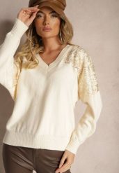 Jasnobeżowy Sweter o Kroju Nietoperza Ozdobiony Cekinami i Cyrkoniami Nevarraea. Brązowe swetry klasyczne damskie Renee, z jeansu, bez kołnierzyka. Za 119.99 zł.
