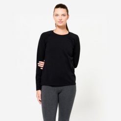Koszulka z długim rękawem damska Domyos Gym & Pilates. Czarne bluzki damskie DOMYOS, xl, bez wzorów, z bawełny, bez kołnierzyka, bez ramiączek. Za 49.99 zł.