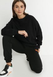 Czarna Bluza z Polarową Podszewką Colda. Czarne bluzy damskie Born2be, l, bez wzorów, z dresówki, bez kaptura. Za 59.99 zł.