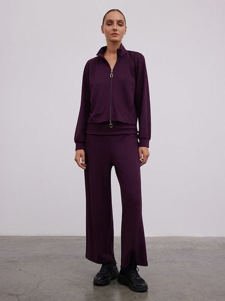 BGN Spodnie w kolorze fioletowym rozmiar: 40. Różowe spodnie materiałowe damskie BGN, bez wzorów, z materiału. Za 96.14 zł.