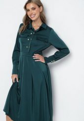 Zielona Rozkloszowana Sukienka o Koszulowym Kroju z Imitacją Kieszeni i Gumką w Talii Rizza. Zielone sukienki damskie Born2be, bez wzorów, eleganckie, bez ramiączek. W wyprzedaży za 152.99 zł.
