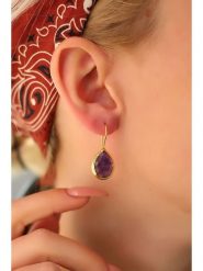 Pierres delicates Pozłacane kolczyki z ametystami rozmiar: onesize. Żółte kolczyki damskie Pierres delicates, z ametystem, pozłacane, z zapięciem typu bigiel. Za 46.45 zł.