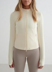 Damska kurtka jedwabista, second skin, dwusuwowy zamek Sense migdałowa biel. Białe kurtki sportowe damskie Aim'n, xs, bez wzorów, z elastanu, bez kaptura. Za 339.00 zł.