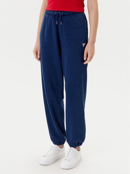 Guess Jeans Spodnie dresowe W5YB65 KCXQ1 Granatowy Regular Fit. Niebieskie spodnie dresowe damskie Guess Jeans, xs, z aplikacjami, z bawełny. Za 209.99 zł.