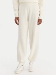 Calvin Klein Underwear Spodnie dresowe LV00QS7569 Écru Regular Fit. Spodnie dresowe damskie Calvin Klein Underwear, l, bez wzorów, z dresówki. Za 299.99 zł.