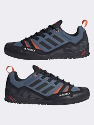 Adidas Buty trekkingowe w kolorze czarno-pomarańczowo-niebieskim rozmiar: 47. Czarne obuwie trekkingowe damskie Adidas, bez zapięcia. Za 402.45 zł.