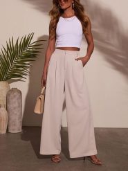 LA Angels Spodnie w kolorze kremowym rozmiar: L. Brązowe spodnie materiałowe damskie LA Angels, bez wzorów, z materiału. Za 148.26 zł.