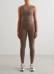 Damskie leginsy wysoki stan, squat proof, szybkoschnące Sense nugat. Brązowe legginsy sportowe damskie Aim'n, s, bez wzorów, z elastanu, z podwyższonym stanem, na fitness i siłownię. Za 192.40 zł.