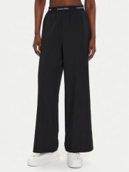 Calvin Klein Performance Spodnie dresowe 00GWF4P606 Czarny Wide Leg. Czarne spodnie dresowe damskie Calvin Klein Performance, s, bez wzorów, z dresówki. Za 369.99 zł.
