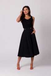 Rozkloszowana spódnica z wysokim stanem i kieszeniami czarna. Czarne spódnice damskie Bewear, na lato, m, bez wzorów, midi. Za 319.00 zł.