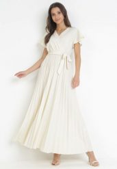 Jasnobeżowa Elegancka Sukienka Maxi w Plisy z Kopertowym Dekoltem i Wiązaniem Thessi. Brązowe sukienki damskie Born2be, bez wzorów, eleganckie, bez ramiączek. Za 109.99 zł.