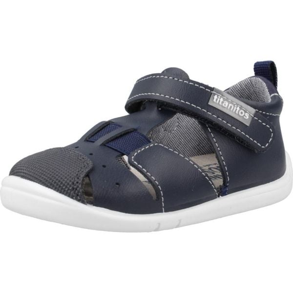 Sandały TITANITOS B500 CLAUDIO Niebieski. Niebieskie sandały damskie TITANITOS, bez wzorów, ze skóry, bez obcasa, bez zapięcia. Za 201.99 zł.