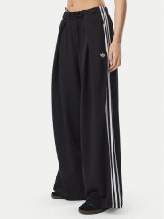 Adidas Spodnie dresowe Adiluna Season 2 X Jennie Pleated Track Tracksuit Bottoms LD8922 Czarny Regular Fit. Czarne spodnie dresowe damskie Adidas, l, bez wzorów, z dresówki. Za 479.99 zł.