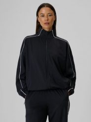 4F Bluza dresowa loose bez kaptura damska - czarna XS. Czarne kardigany damskie 4F, l, bez wzorów, z dresówki. Za 179.99 zł.