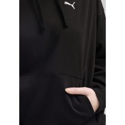 Damska wygodna prążkowana bluza z kapturem ESS ELEVATED PUMA Black. Czarne bluzy damskie Puma, xl, bez wzorów, prążkowane, z kapturem. W wyprzedaży za 114.00 zł.