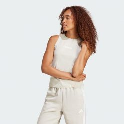 Koszulka Essentials Linear Slim Cotton Tank. Białe koszulki damskie Adidas, xl, bez wzorów, bez kołnierzyka, bez ramiączek. Za 89.95 zł.