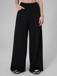 4F Spodnie dresowe z szerokimi nogawkami damskie - czarne L. Czarne spodnie dresowe damskie 4F, l, bez wzorów, z bawełny. Za 149.99 zł.