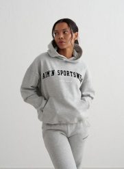 Damska bluza z kapturem, drapany polar, luźny Varsity Sweat Hood szary melanż. Szare bluzy damskie Aim'n, l, bez wzorów, z bawełny, z kapturem. Za 339.00 zł.