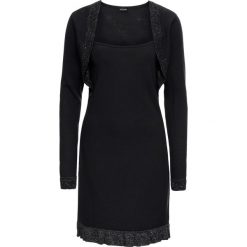 Sukienka dzianinowa z falbaną i połyskiem bonprix czarno-srebrny. Czarne sukienki damskie bonprix, z dzianiny, eleganckie. Za 79.99 zł.