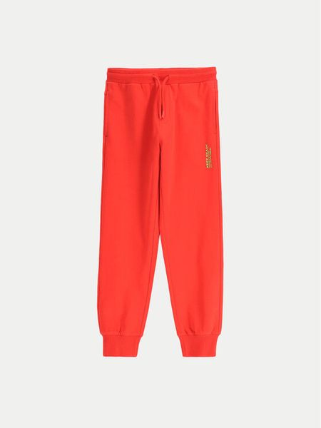 Coccodrillo Spodnie dresowe WC5120101VBA Czerwony Regular Fit. Czerwone spodnie dresowe chłopięce COCCODRILLO, z bawełny. Za 49.99 zł.