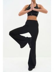 Onamaste Legginsy sportowe "Flair" w kolorze czarnym rozmiar: L/XL. Czarne legginsy damskie Onamaste, l, bez wzorów, z materiału. Za 162.49 zł.