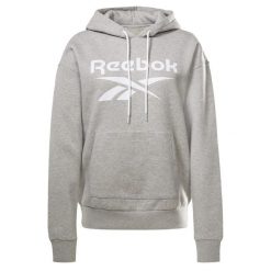 Damska bluza z kapturem Reebok Identity Logo Fleece. Fioletowe bluzy damskie Reebok, na jesień, s, bez wzorów, z bawełny, z kapturem. Za 275.15 zł.