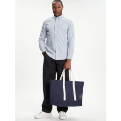 Torebka Tommy Hilfiger. Niebieskie shopper bag Tommy Hilfiger, bez wzorów, bez dodatków. Za 269.99 zł.