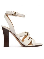 Guess Sandały FLJRAD LEA03 Kremowy. Białe sandały damskie Guess, z aplikacjami, ze skóry, bez obcasa, na słupku, bez zapięcia. Za 719.99 zł.