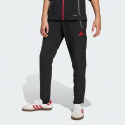 Spodnie Liverpool FC Tiro 25 Competition Vis Tech Travel. Czarne spodnie sportowe damskie Adidas, bez wzorów, do piłki nożnej. Za 279.00 zł.