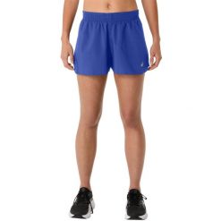 Spodenki sportowe damskie Core Split Short. Niebieskie spodenki sportowe damskie Asics, bez wzorów, z poliesteru, do biegania. Za 129.99 zł.