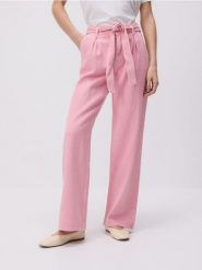 Jeansy wide leg z wiązaniem - różowy. Czerwone jeansy damskie Reserved. W wyprzedaży za 99.99 zł.