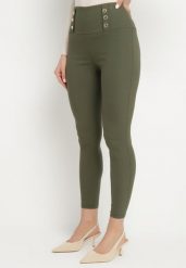 Ciemnozielone Legginsy z Wysokim Stanem Ozdobione Guzikami Kolithra. Zielone legginsy damskie Born2be, l, bez wzorów, z jeansu. Za 39.99 zł.