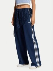 Adidas Spodnie dresowe 2In1 Firebird Loose Track Trousers With Lace Skirt LG4273 Niebieski Relaxed Fit. Niebieskie spodnie dresowe damskie Adidas, xl, bez wzorów, z dresówki. Za 369.99 zł.