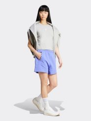 Adidas Szorty w kolorze błękitnym rozmiar: 128. Niebieskie szorty damskie Adidas, bez wzorów, z bawełny. Za 114.17 zł.