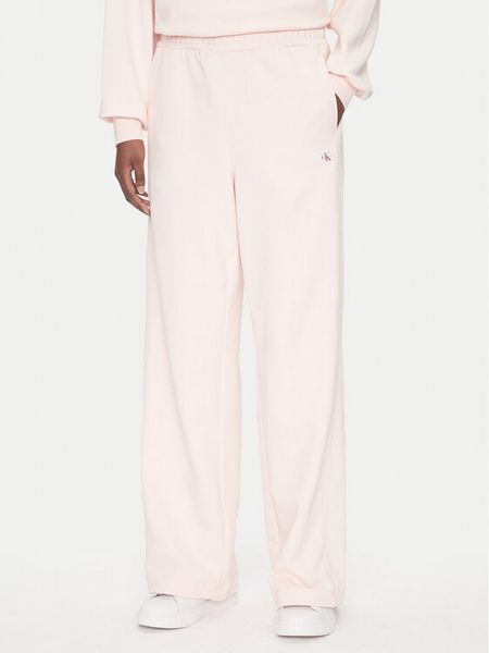 Calvin Klein Jeans Spodnie dresowe LV047C249G Różowy Regular Fit. Czerwone spodnie dresowe damskie Calvin Klein Jeans, l, bez wzorów, z bawełny. Za 239.99 zł.