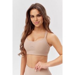 Stanik sportowy treningowy fitness Rough Radical Sports Bra Wellness. Brązowe biustonosze sportowe damskie ROUGH RADICAL, bez wzorów. W wyprzedaży za 118.92 zł.