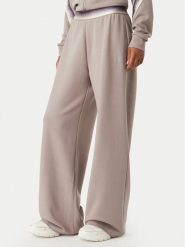 EA7 Emporio Armani Spodnie dresowe 7W001517 AF12501 U6100 Beżowy ciemny Wide Leg. Brązowe spodnie dresowe damskie EA7 Emporio Armani, xl, bez wzorów, z dresówki. Za 514.99 zł.