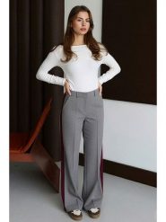 Trendyol Spodnie w kolorze szarym rozmiar: 38. Szare spodnie materiałowe damskie Trendyol, bez wzorów, z materiału. Za 117.99 zł.