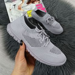 Buty sportowe damskie wsuwane ażurowe szare News 1020. Szare obuwie sportowe casual damskie NEWS, z materiału, bez zapięcia. Za 109.99 zł.