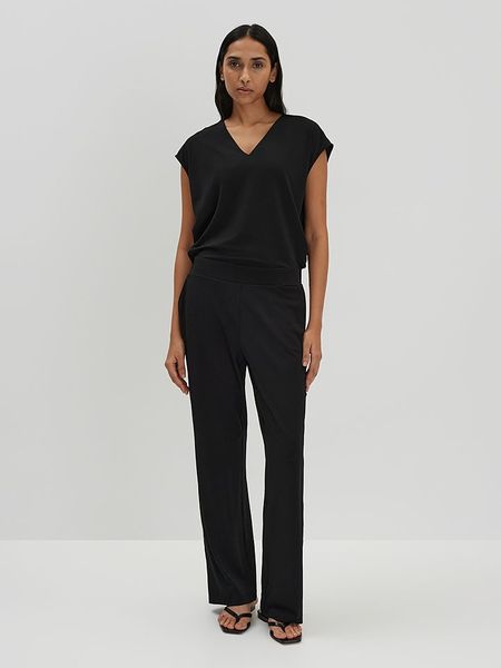 Someday Kombinezon w kolorze czarnym rozmiar: 38. Czarne kombinezony damskie someday., bez wzorów, bez kołnierzyka, bez ramiączek. Za 292.20 zł.