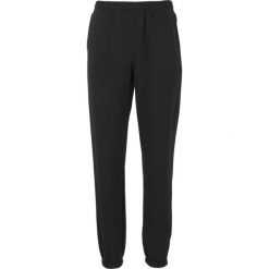 Damskie spodnie dresowe Athlecia Ruthie. Czarne spodnie dresowe damskie Athlecia, bez wzorów, z bawełny. Za 164.00 zł.