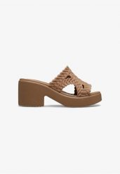 Klapki Dla Dorosłych Crocs Brooklyn Woven Heel Slide. Brązowe klapki damskie Crocs, bez wzorów, z materiału, bez obcasa, bez zapięcia. Za 263.99 zł.