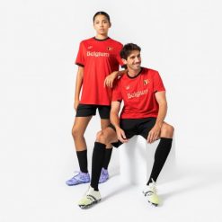 Koszulka piłkarska dla kibiców Belgia 2026. Czarne bluzki damskie KIPSTA, xl, bez wzorów, z materiału, sportowe, bez kołnierzyka, bez ramiączek. Za 44.99 zł.