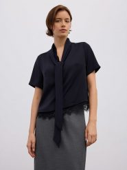 BGN Bluzka w kolorze czarnym rozmiar: 40. Czarne bluzki damskie BGN, bez wzorów, z koronki, bez kołnierzyka, bez ramiączek. Za 78.84 zł.