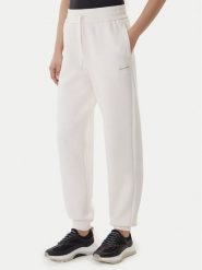 Armani Exchange Spodnie dresowe XW001287 AF16134 U1003 Écru Regular Fit. Spodnie dresowe damskie Armani Exchange, l, bez wzorów, z dresówki. Za 509.99 zł.