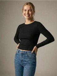 Koszulka z długim rękawem basic - czarny. Czarne koszulki damskie Sinsay, l, bez wzorów, bez kołnierzyka, bez ramiączek. Za 19.99 zł.